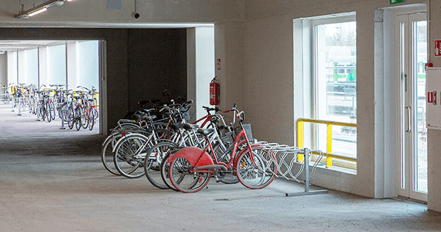 background Milesight Network Camera secures bicycle parking area in Asunto Oy Oulun Asemantorni I Apartment