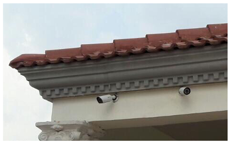 The Milesight Mini Bullet Network Cameras installed on the exterior wall of the Royal Palace of Benin.